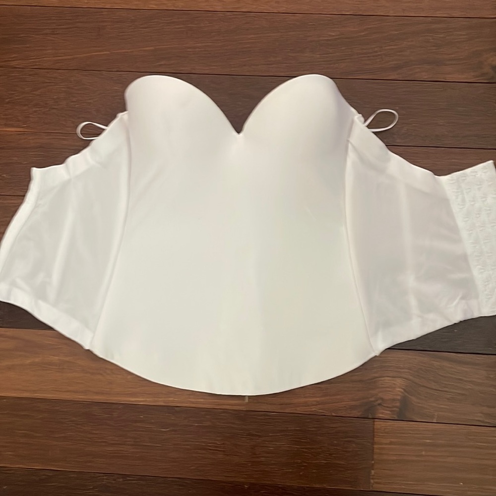 Brand new without tags. Tried on but never worn.